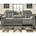 Graues modernes Relaxsofa mit herunterklappbarem Tisch