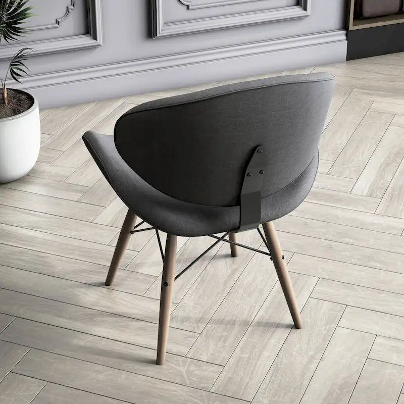 Fauteuil d’appoint de style mi-siècle en similicuir noir avec pieds en bois évasés