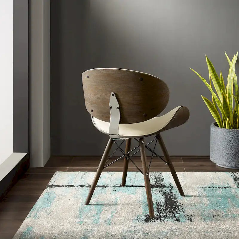 Fauteuil d’appoint de style mi-siècle en similicuir noir avec pieds en bois évasés