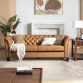 82.5 Inch Tufted Genuine Leather Chesterfield Sofa with Flared Arms